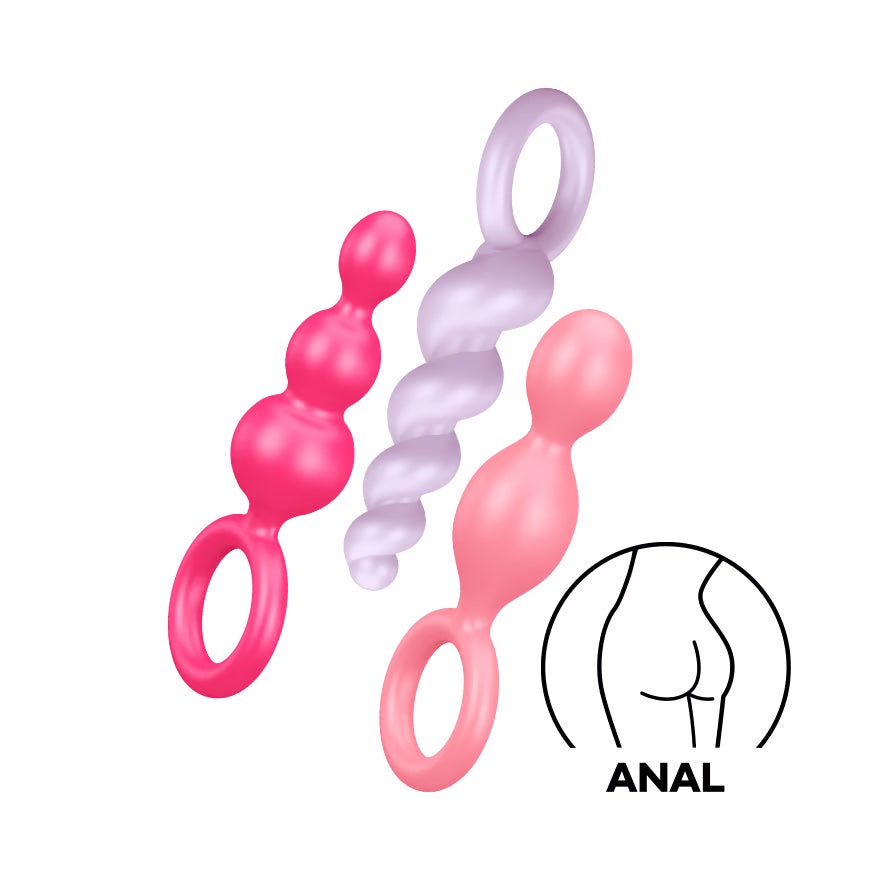 a pair of pink, purple, and white butt plugs