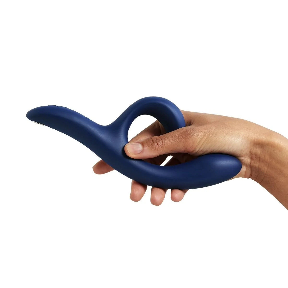 a person holding a vibrator in their hand