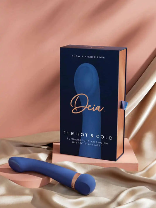 The Hot and Cold - Deia - Blue silicone Deia Hot and Cold vibrator with gold accent next to navy and gold branded ouiboutique box. - chaleur, point g, vibrateur