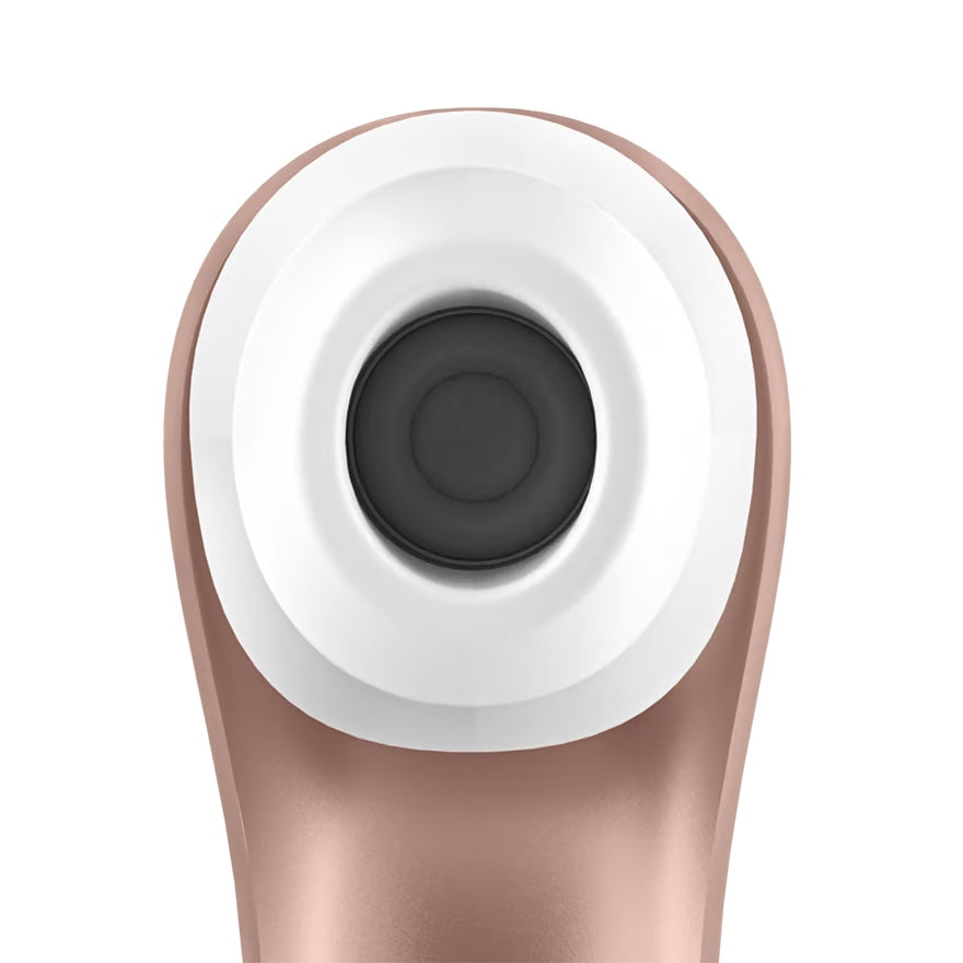 a close up of a pink and white object on a white background