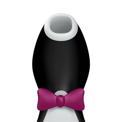 a black and white object with a pink bow